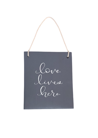 Lives Here Plaque